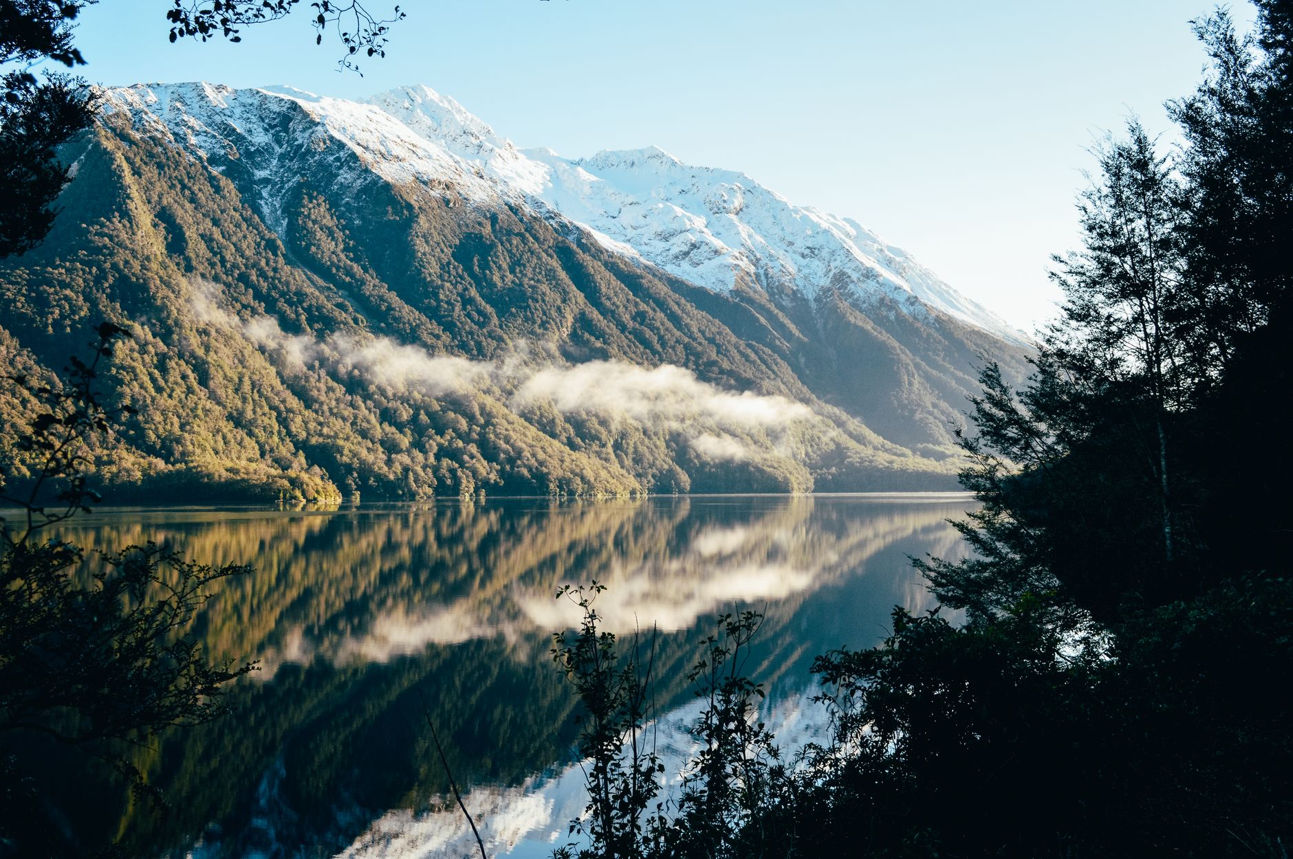 Stunning New Zealand fiords and mountains landscape with clouds